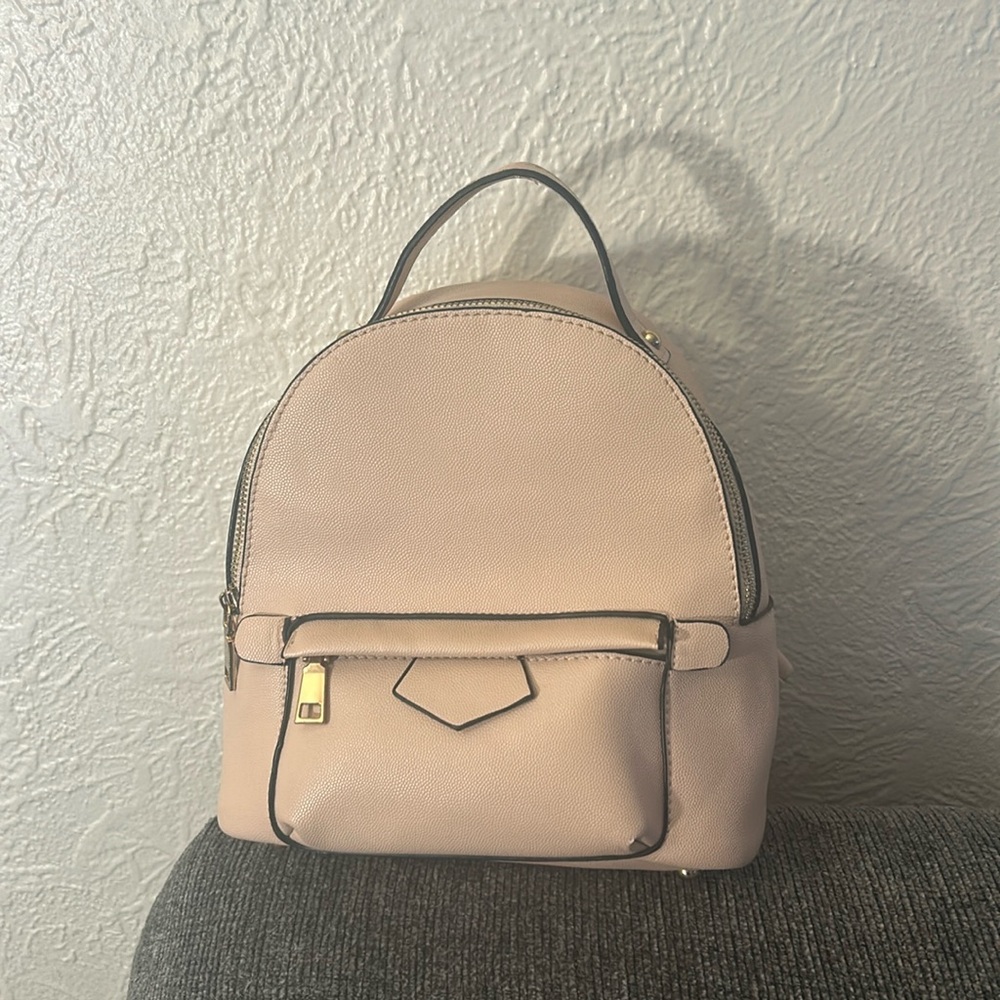Light pink backpack purse